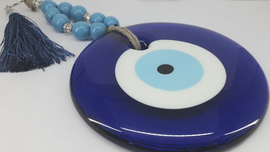 a blue toilet with a blue seat on top of it